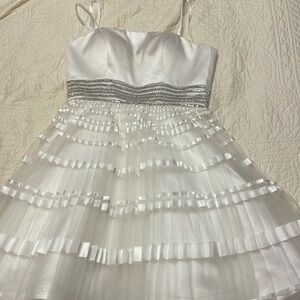 White puffy Jovani dress.